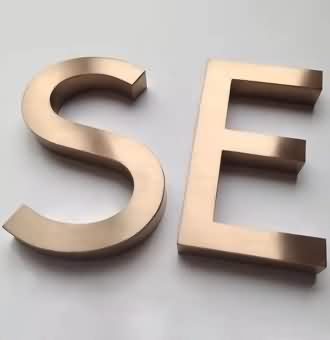 brushed stainless steel letter sign